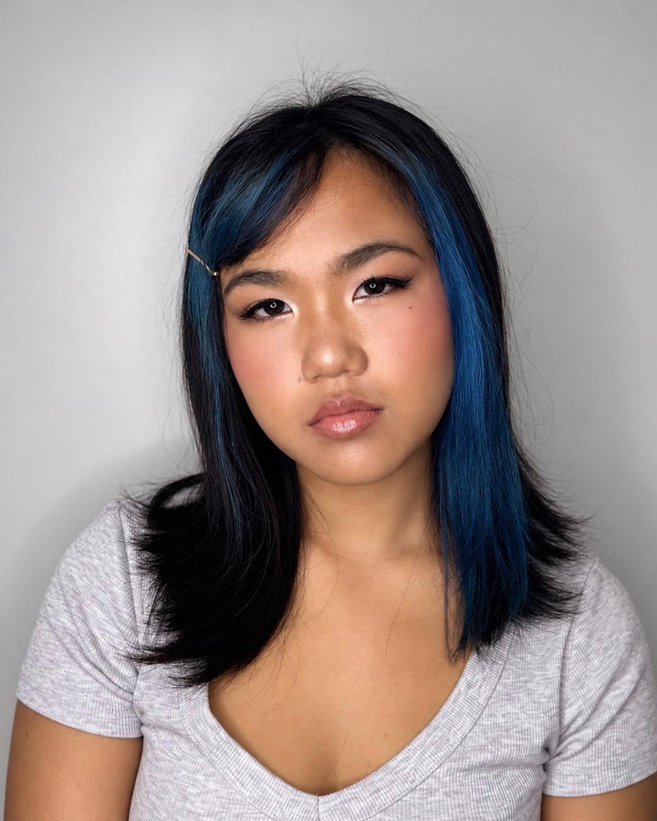 ABG glam: soft liner and a glossed nude lip, hair pinned back